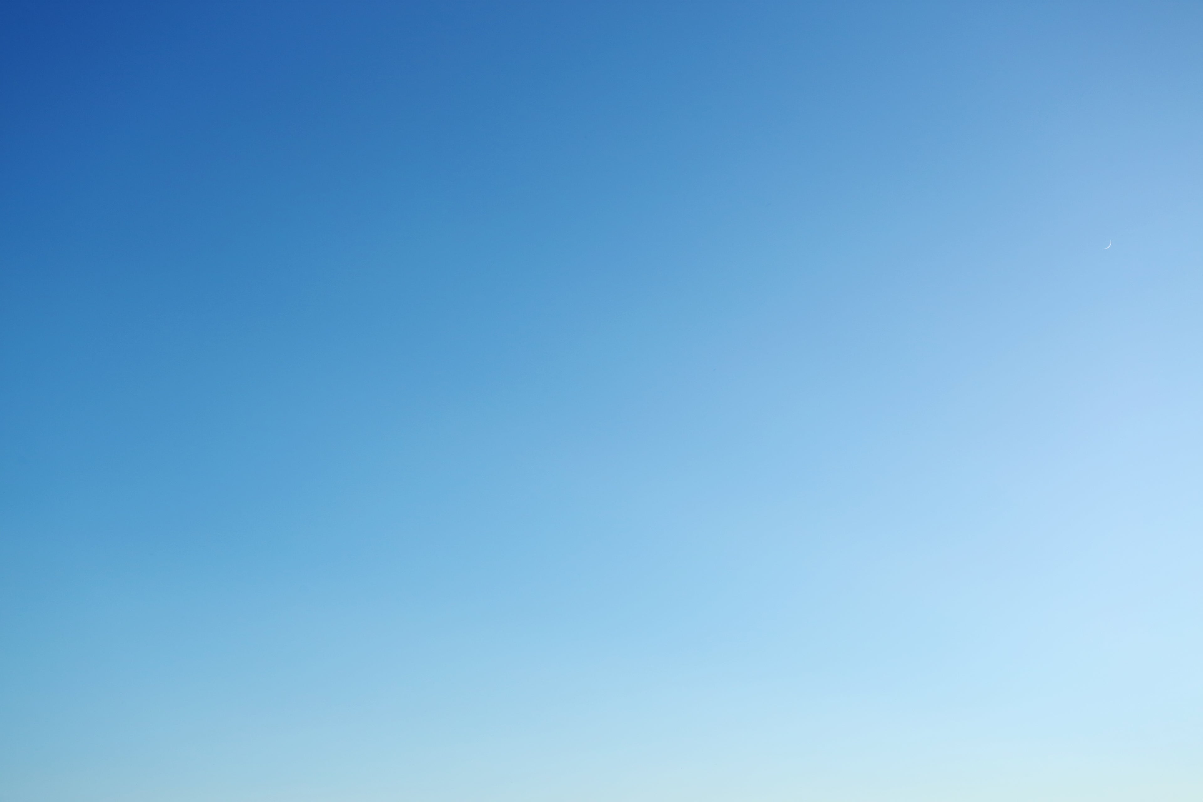 Gradient blue sky with a clear background