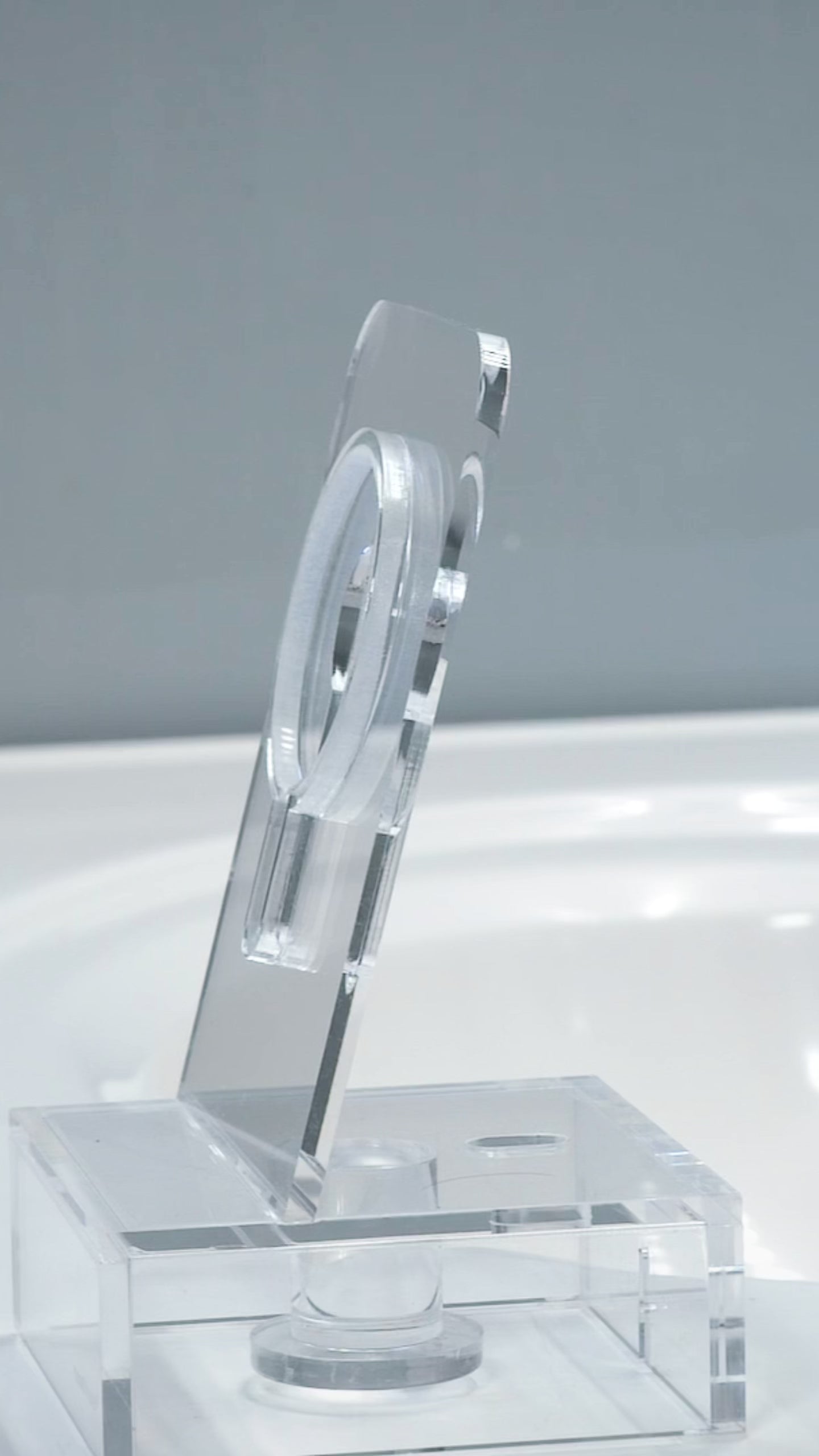 Video demonstrating the soft, compressible nature of the Pippa resistance spring by pushing it through and removing it easily from an acrylic plane with a hole cut through it.